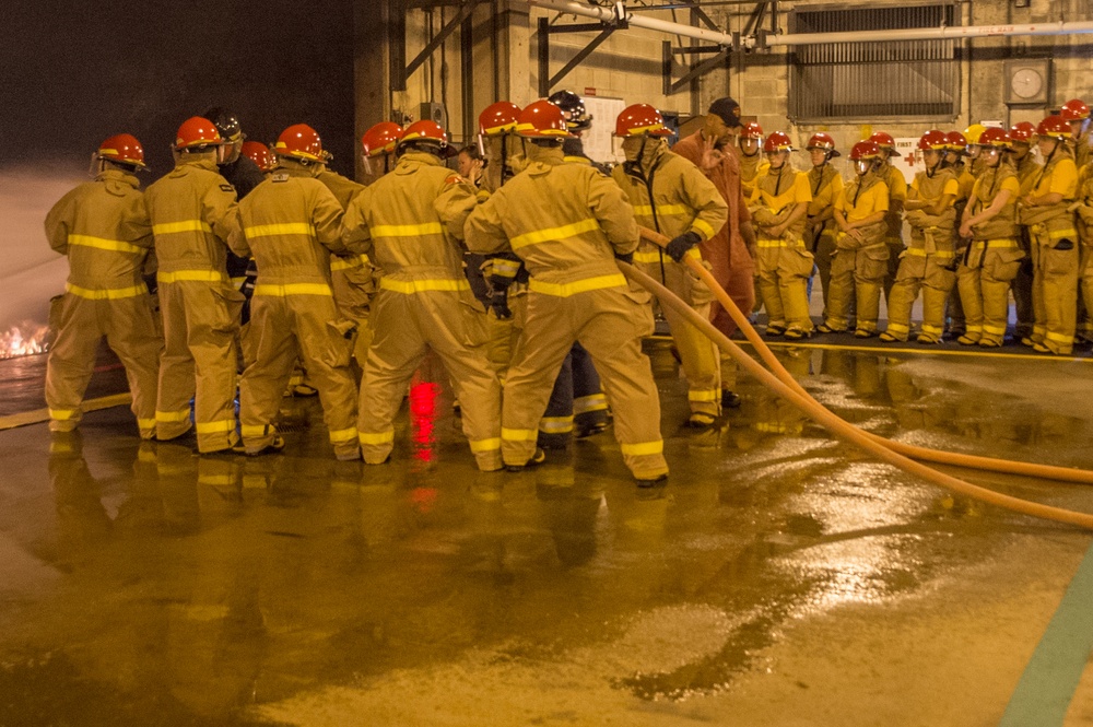 Officer Development School (ODS) class 19-050 here at Officer Training Command, Newport, Rhode Island, conduct shipboard firefighting training July 30, 2019.