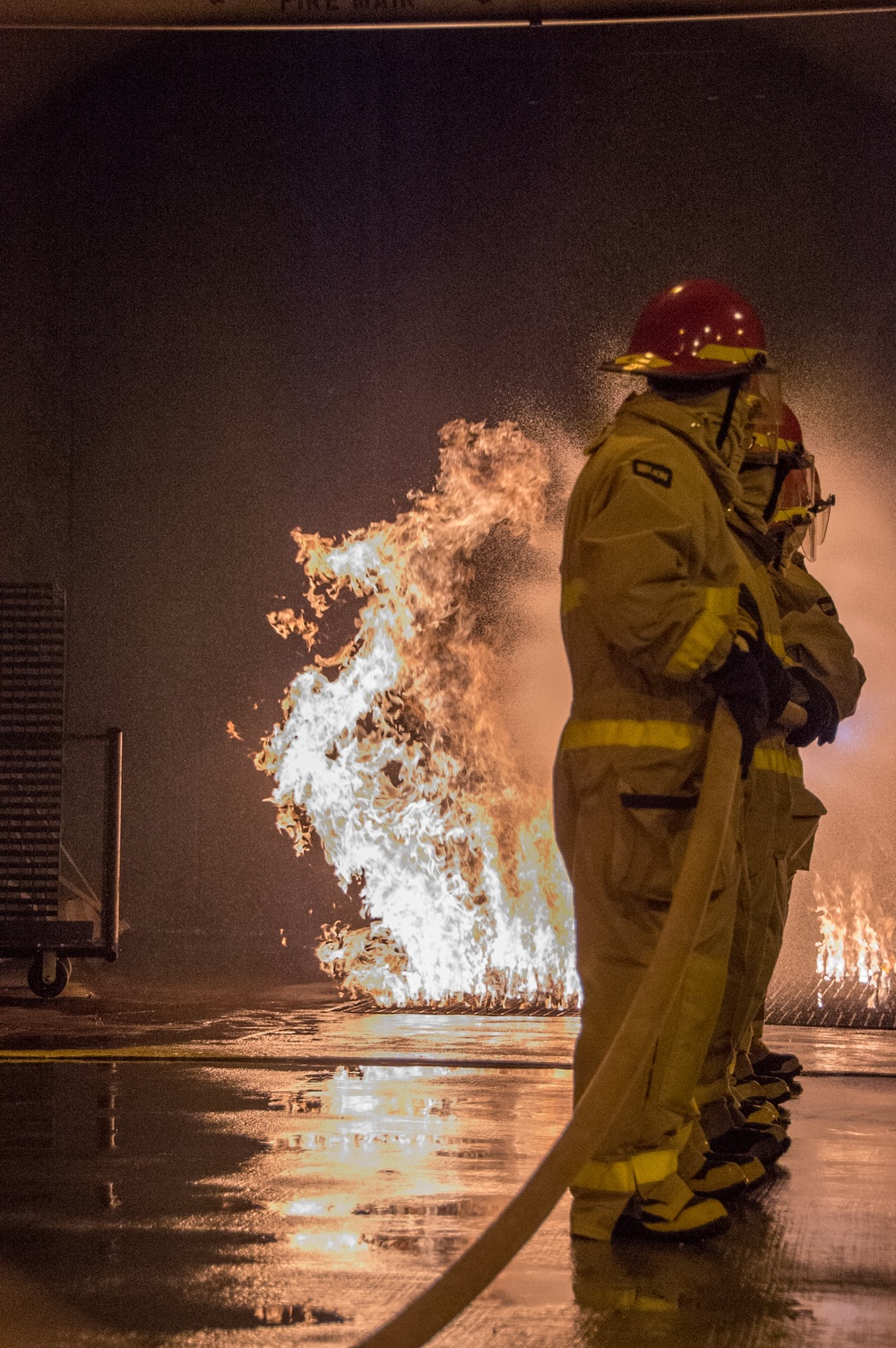 Officer Development School (ODS) class 19-050 here at Officer Training Command, Newport, Rhode Island, conduct shipboard firefighting training July 30, 2019.