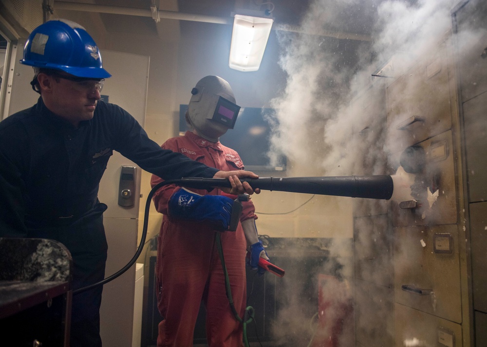 USS Makin Island cuts high security locks.