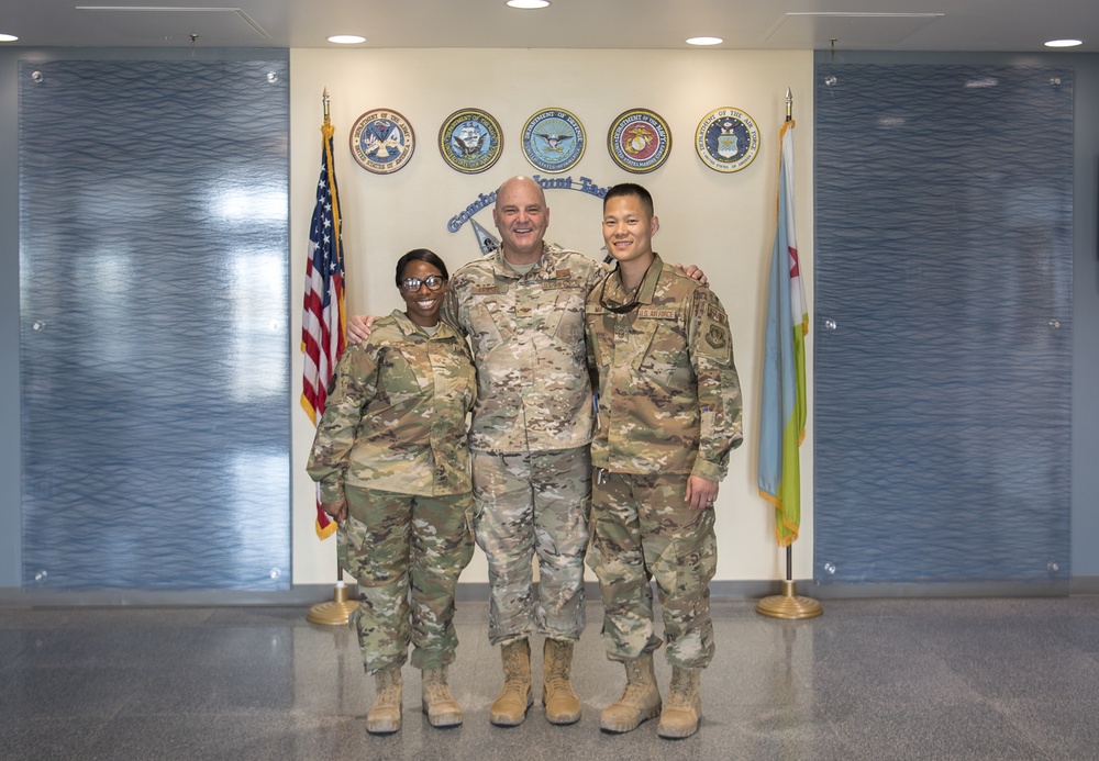 CJTF-HOA DCG poses with members of 142d Fighter Wing