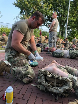 Army medic puts duty first during large marching event
