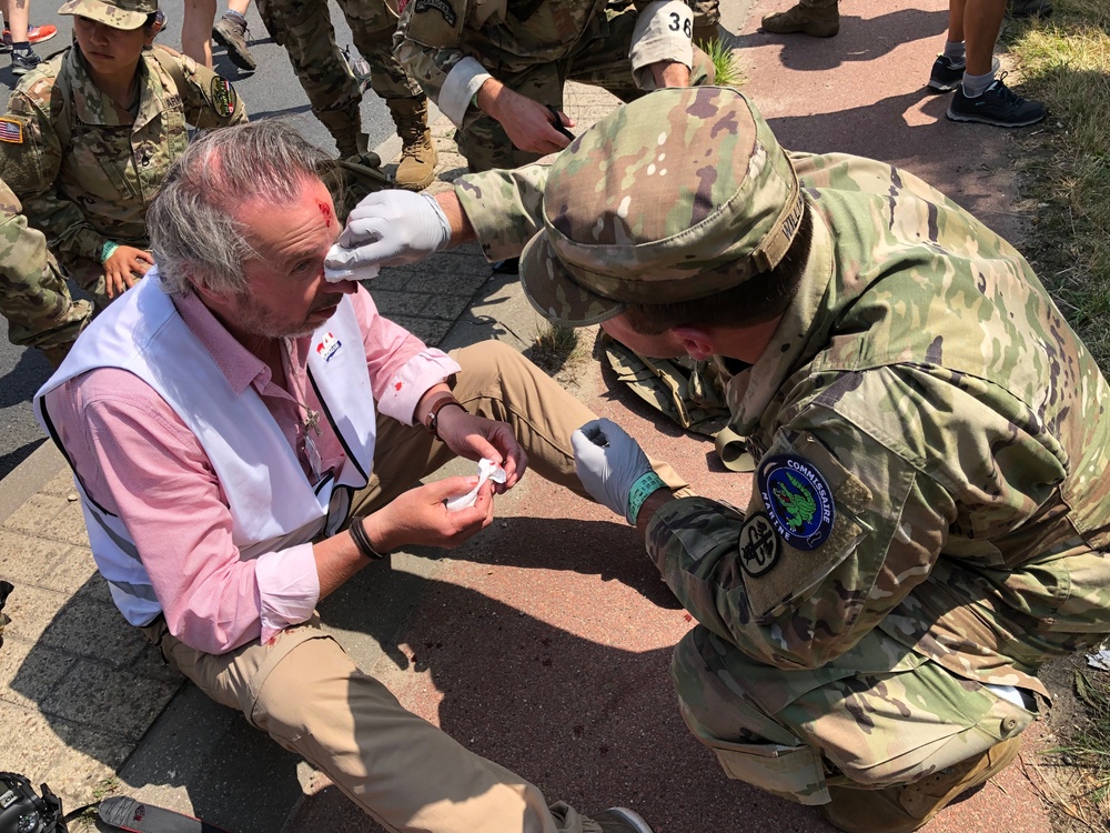 Army medic puts duty first during large marching event