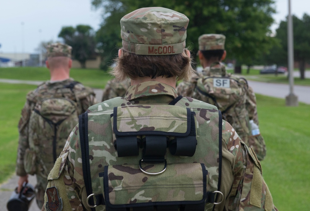 Chief Master Sgt. Katie McCool participates in ruck march with Whiteman AFB SF Airmen