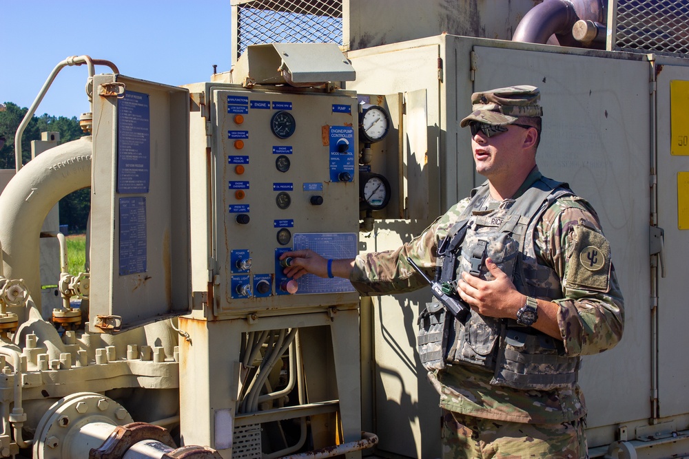 Soldier operates pump station during QLLEX-E