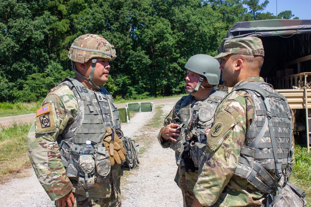 Soldiers discuss operations during QLLEX-E