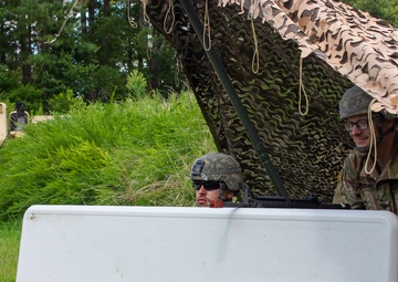Soldiers performing guard duty during QLLEX-E