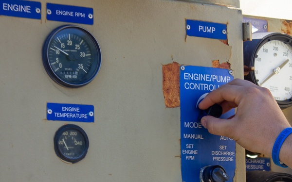 Soldier operates pump station during QLLEX-E