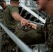 U.S. Marines disembark the USNS Fall River