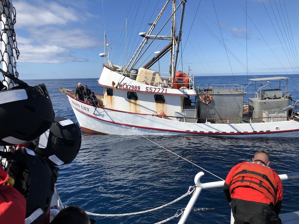 Coast Guard crew tows the fishing vessel Ruby Lily