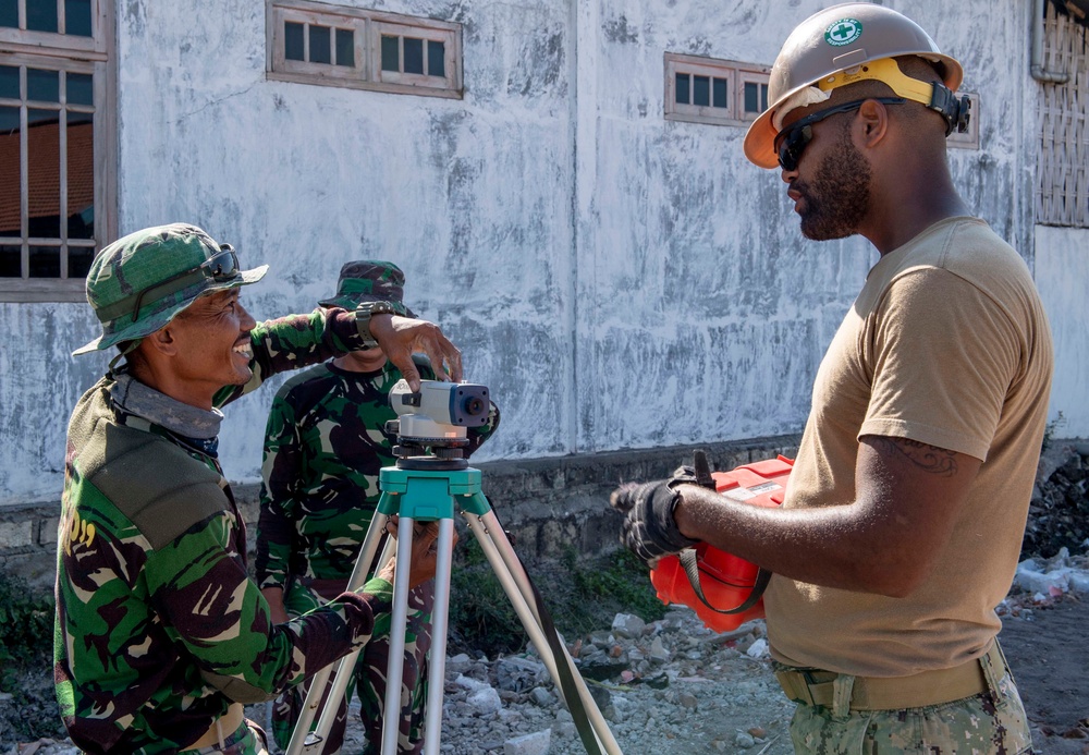 NMCB-4, Indonesian National Armed Forces continue construction at SDN Duduk Sampeyan Elementary School during CARAT 2019