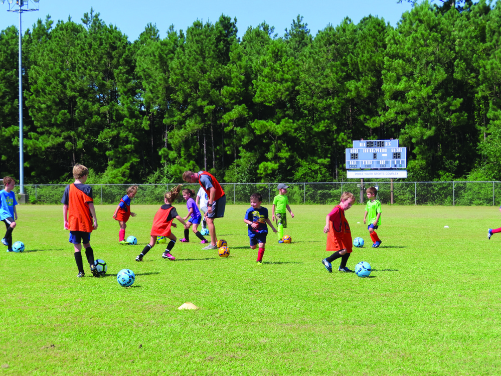 Fort Polk kids have fun, learn skills at soccer camp