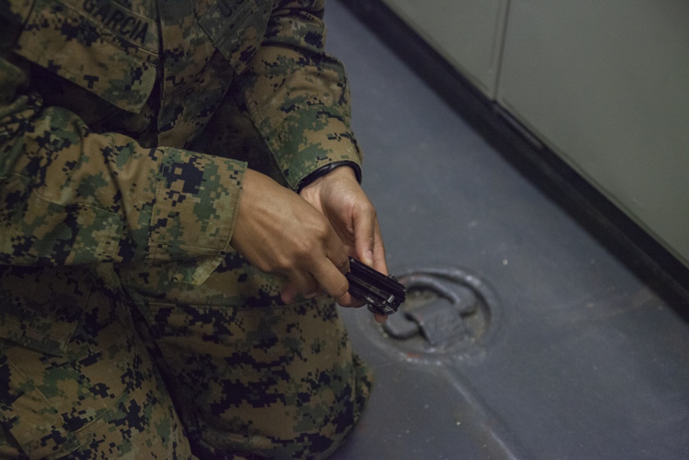 Fleet Marine Force: 31st MEU hospitalman conducts weapons disassembly aboard USS Wasp