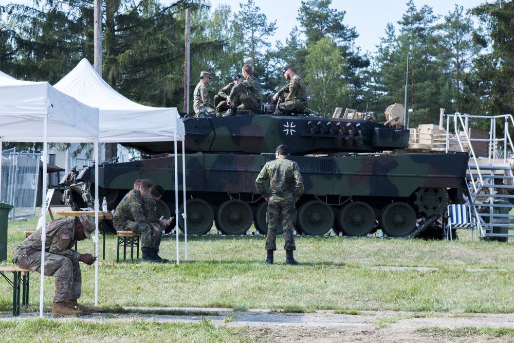 German and American Soldiers prepare for the fesitivites.