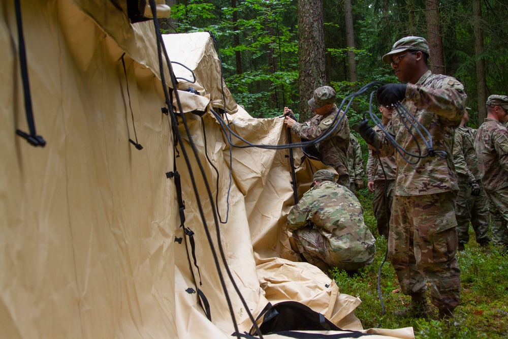 1/4 Cav Soldiers set up squadron communications center for upcoming exercise