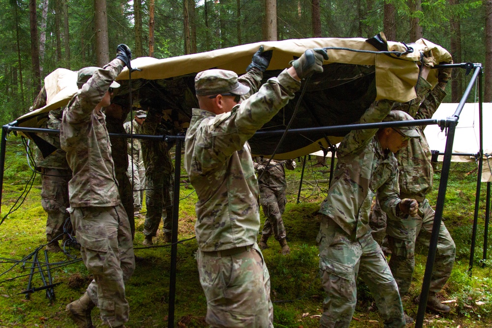 1/4 Cav Soldiers set up squadron communications center for upcoming exercise