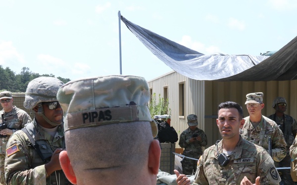 Distinguished civilian and military leaders visit the training sites for combined arms exercise Patriot Crucible at Camp Edwards August 3.