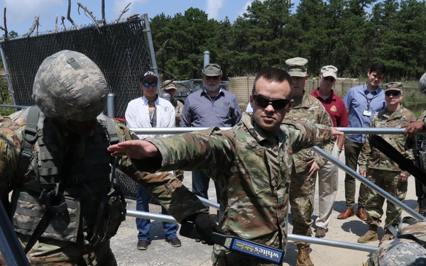 Distinguished civilian and military leaders visit the training sites for combined arms exercise Patriot Crucible at Camp Edwards August 3.