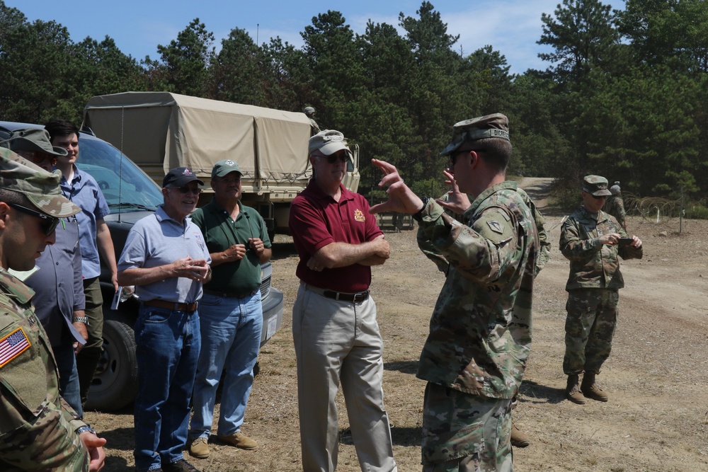 Distinguished civilian and military leaders visit the training sites for combined arms exercise Patriot Crucible at Camp Edwards August 3.