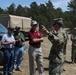 Distinguished civilian and military leaders visit the training sites for combined arms exercise Patriot Crucible at Camp Edwards August 3.