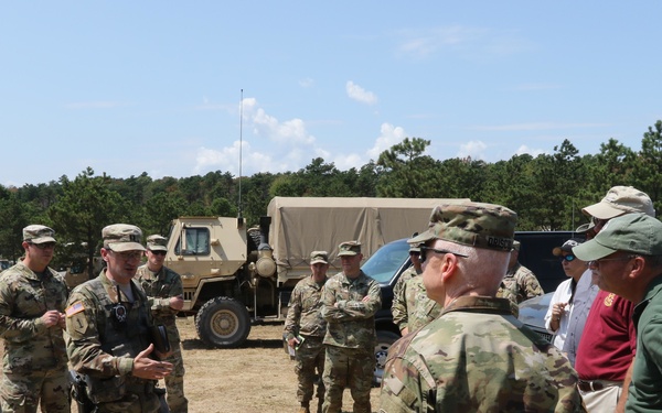 Distinguished civilian and military leaders visit the training sites for combined arms exercise Patriot Crucible at Camp Edwards August 3.