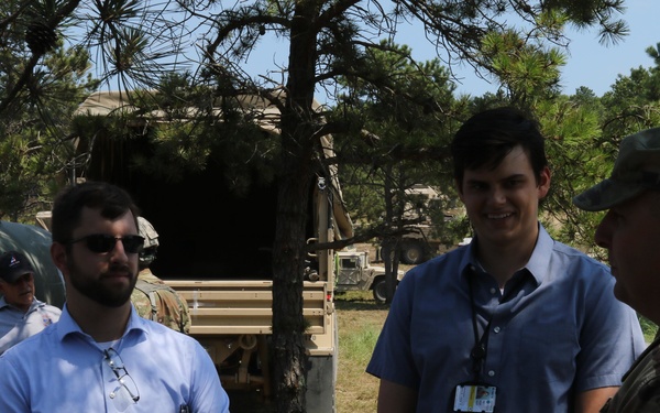 Distinguished civilian and military leaders visit the training sites for combined arms exercise Patriot Crucible at Camp Edwards August 3.