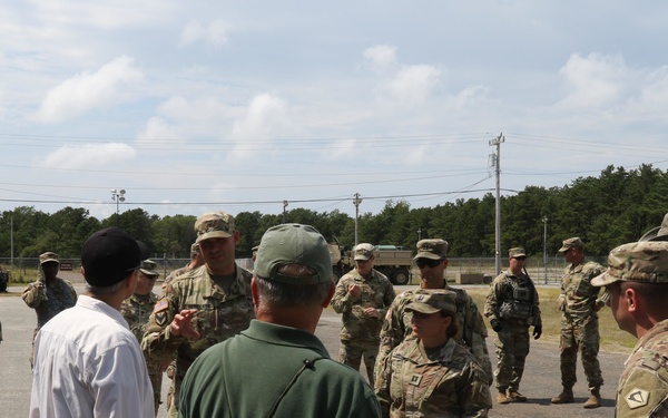 Distinguished civilian and military leaders visit the training sites for combined arms exercise Patriot Crucible at Camp Edwards August 3.