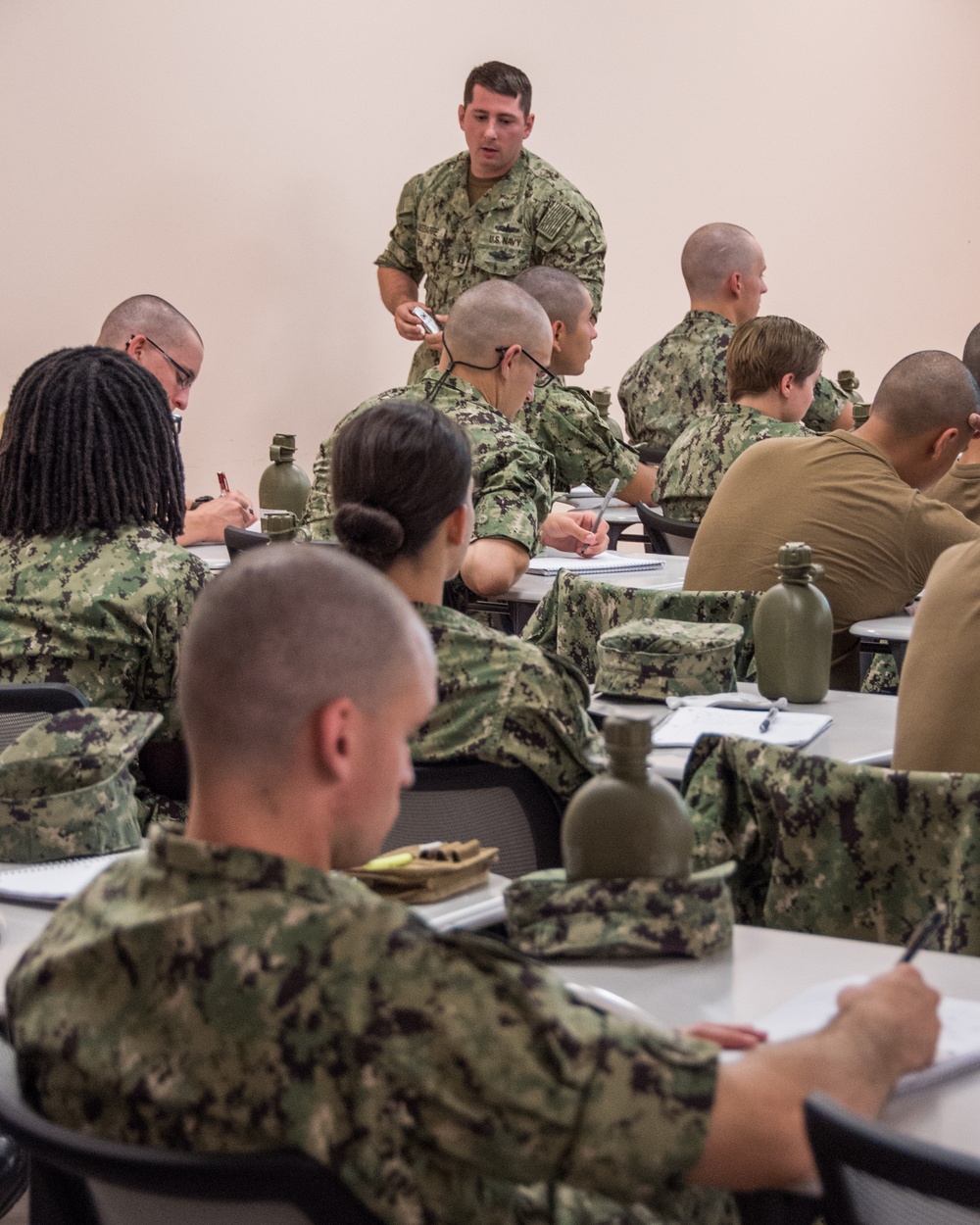 Lt. Samuel R. Gasbarre, an instructor here at Officer Training Command, Newport, Rhode Island, (OTCN) teaches the history of the Navy and Marine Corps to Officer Candidate School (OCS) class 17-19 on Aug. 5, 2019.