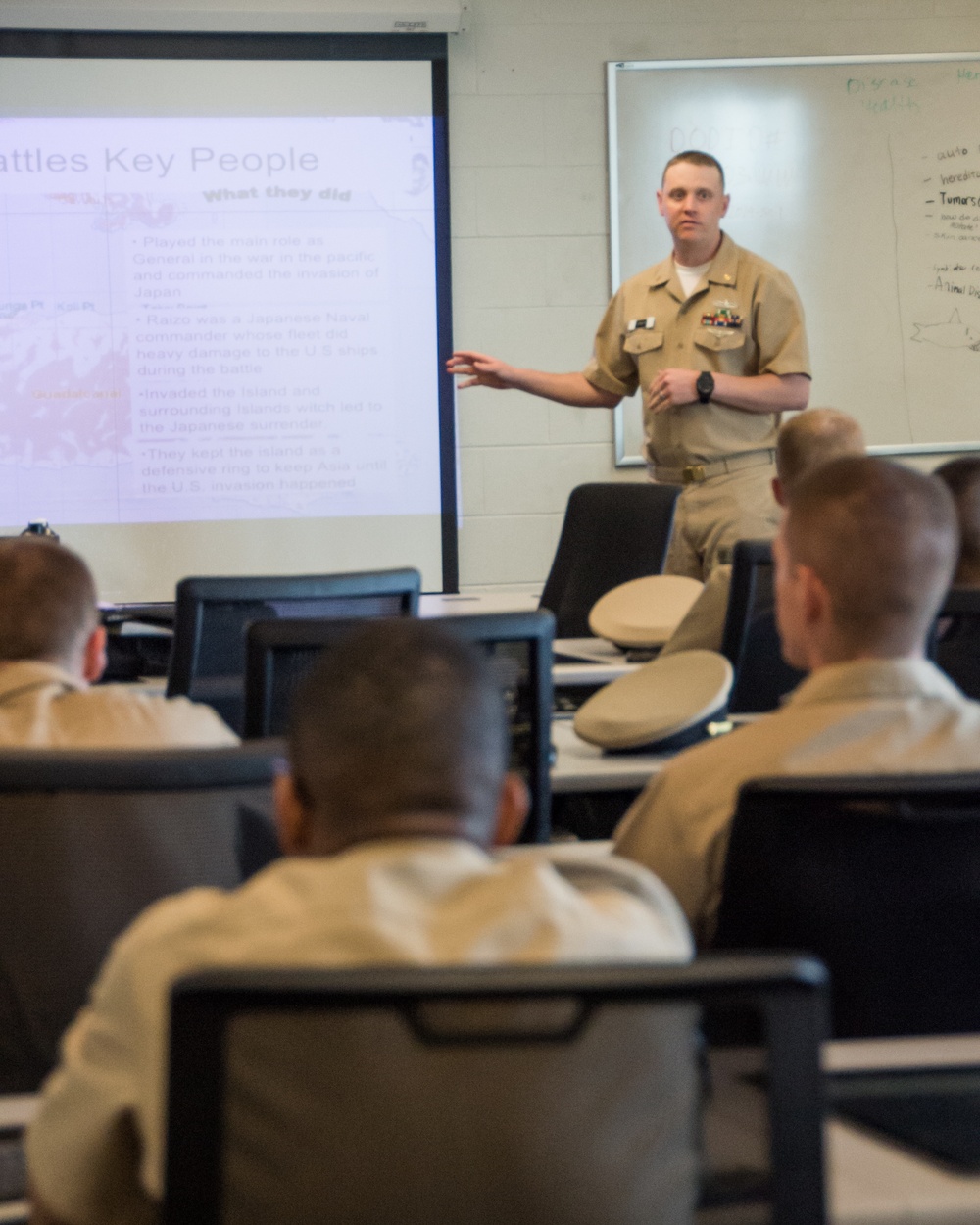 Officer Candidate School (OCS) class 15-19 here at Officer Training Command, Newport, Rhode Island, (OTCN) conduct student-led presentations about U.S. Naval history on Aug. 5, 2019.