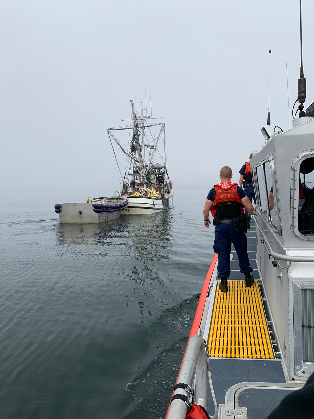 Coast Guard boat crew, Ketchikan EMS medevac injured fisherman in Revillagigedo Channel, Alaska
