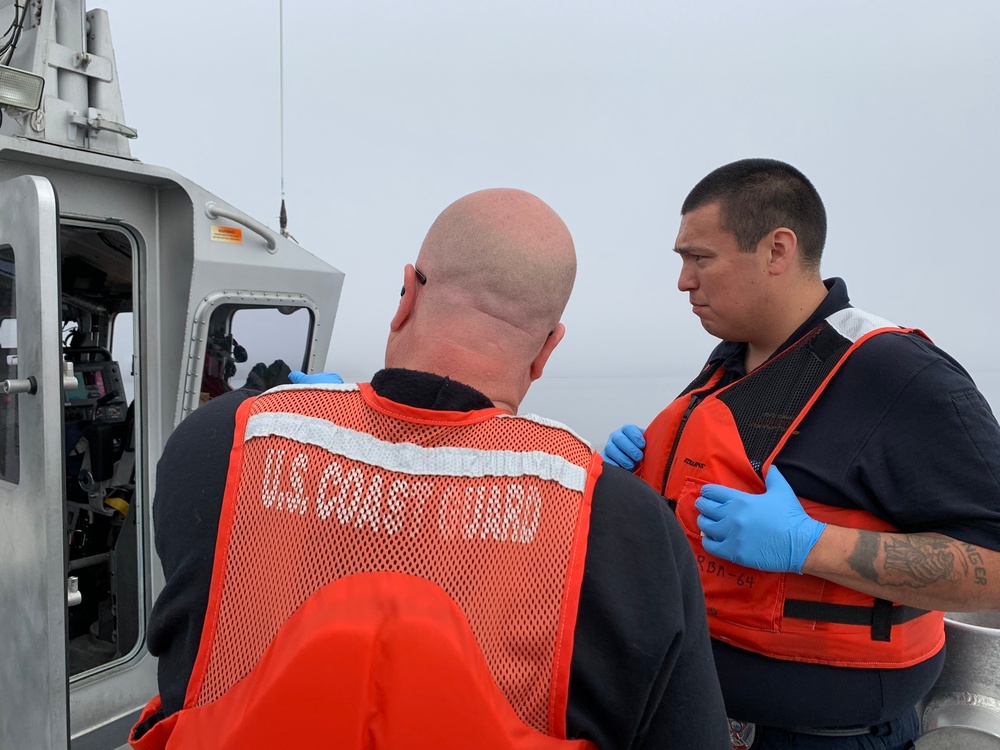 Coast Guard boat crew, Ketchikan EMS medevac injured fisherman in Revillagigedo Channel, Alaska