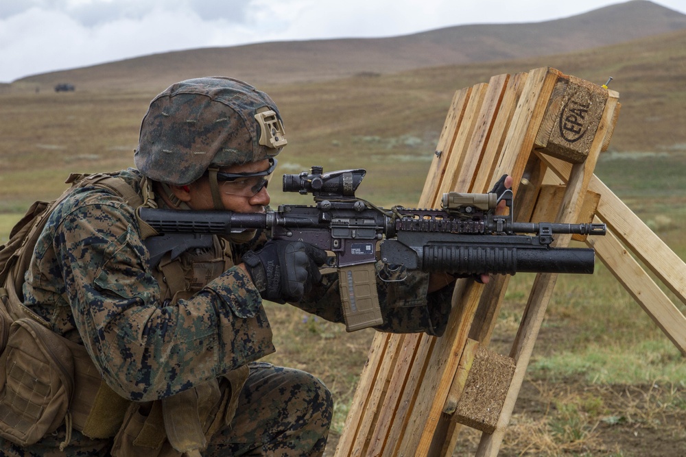 U.S. Marines and British soldiers conduct stress shoot