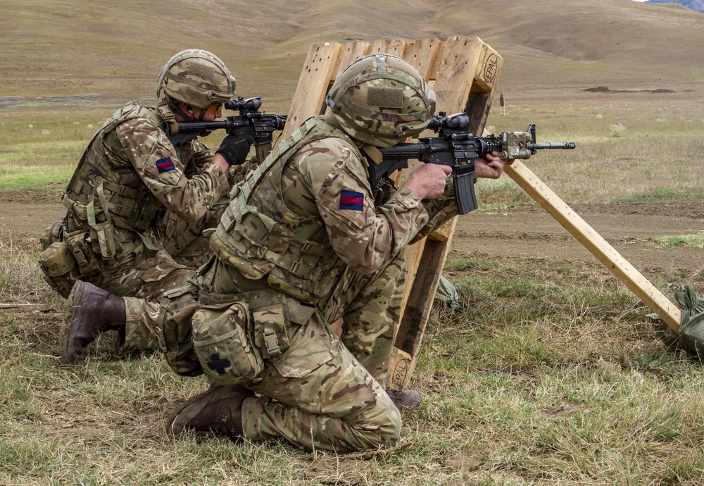 U.S. Marines and British soldiers conduct stress shoot