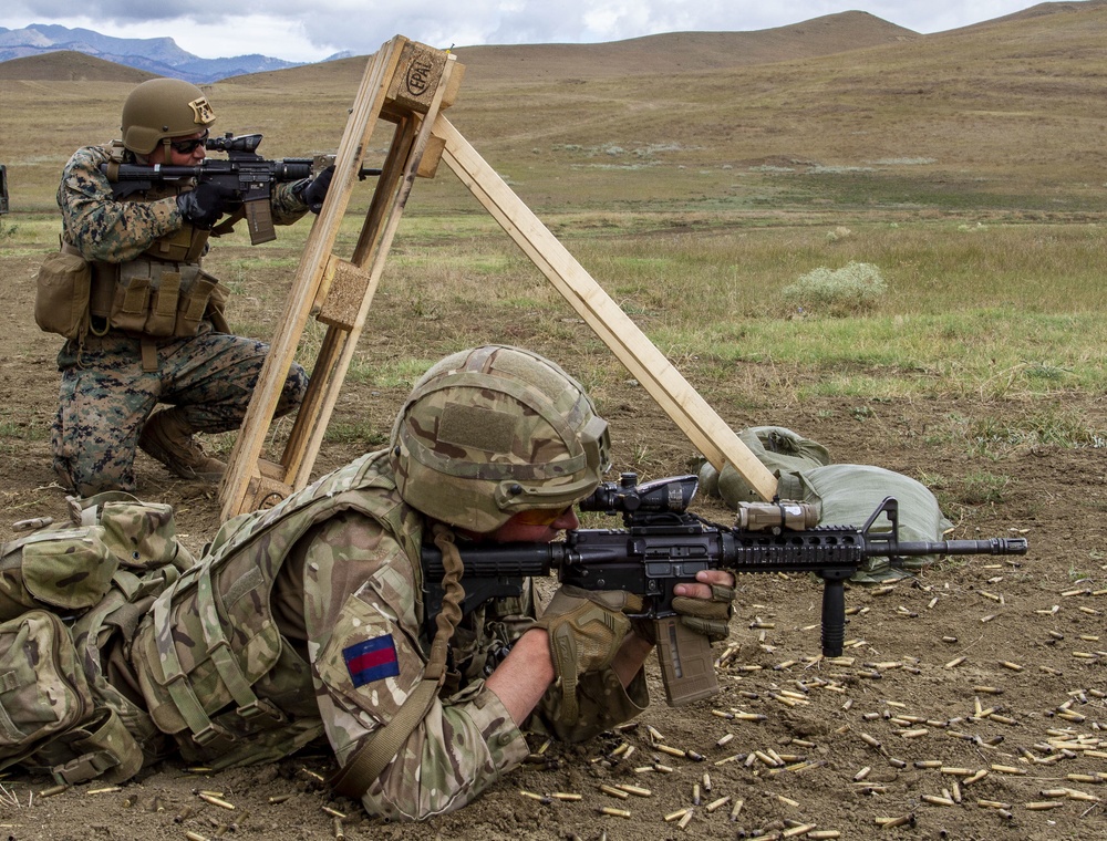 U.S. Marines and British soldiers conduct stress shoot