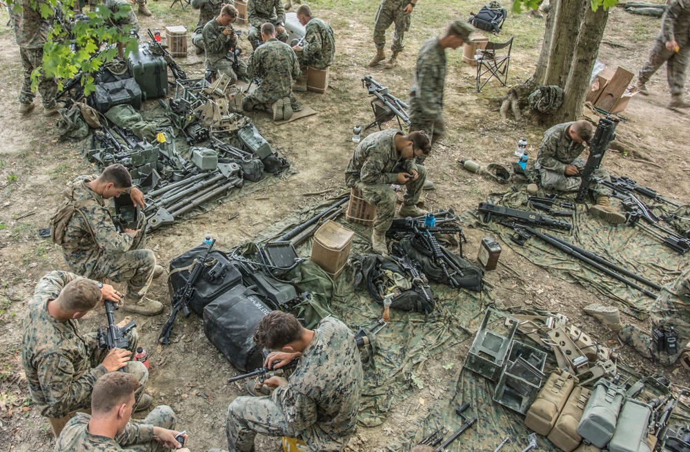 3/23 Weapons Company cleans weapons after leaving ranges