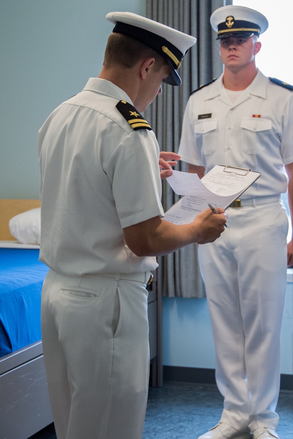 190807-N-TE695-0002 NEWPORT, R.I. (Aug. 7, 2019) – Officer Candidate School (OCS) class 16-19 is inspected by class officers during their eighth week here at Officer Training Command, Newport, Rhode Island, (OTCN) on Aug. 7, 2019.