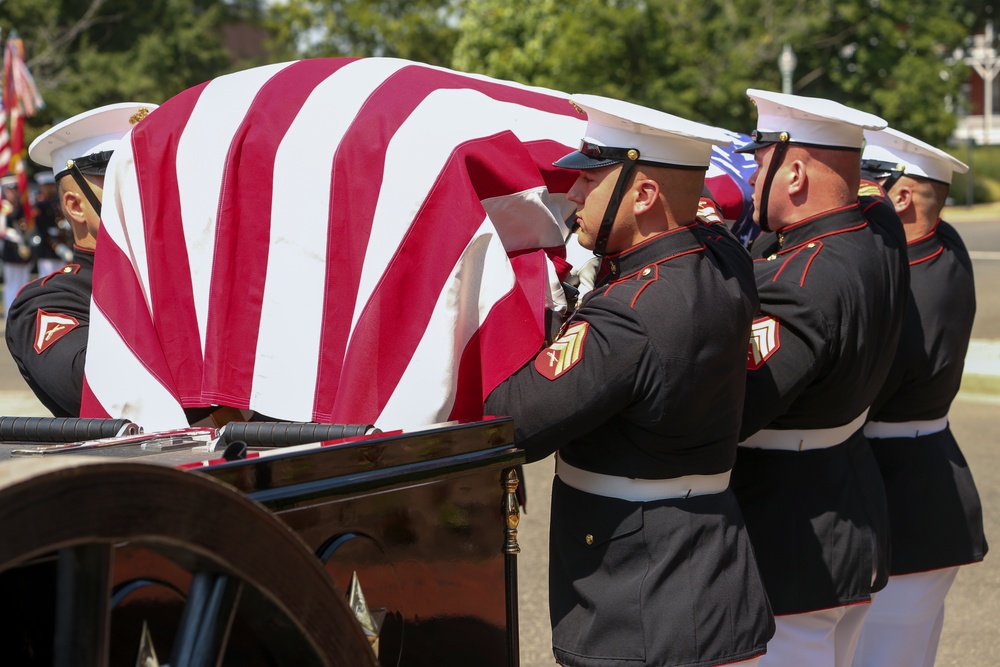 Marines escort the casket of Maj. Gen. Ronald L. Beckwith
