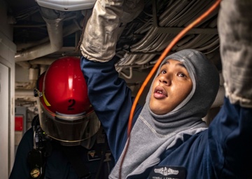 Sailors conduct a DC Drill in MMR 1