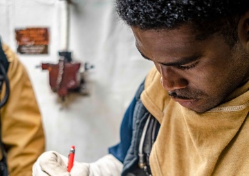 Sailors conduct a DC Drill in MMR 1