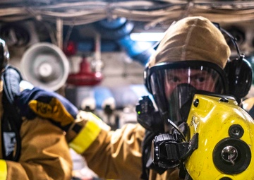 Sailors conduct a DC Drill in MMR 1
