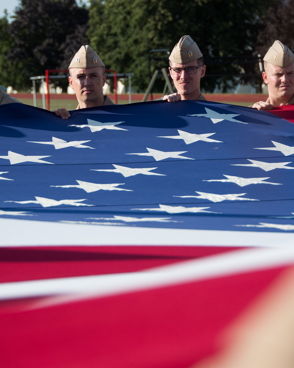 Graduating class 19050 of Officer Development School (ODS) here at Officer Training Command, Newport, Rhode Island, conduct a flag ceremony on Aug. 8, 2019.