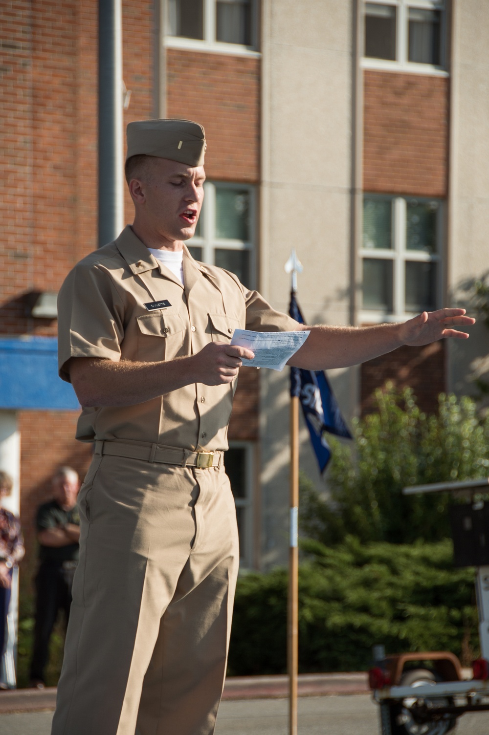 190808-N-TE695-0008 NEWPORT, R.I. (Aug. 8, 2019) – Ensign Matthew D. Civilette, with graduating class 19050 of Officer Development School (ODS) here at Officer Training Command, Newport, Rhode Island, reads ‘My Name is Old Glory’ poem on Aug. 8, 2019.