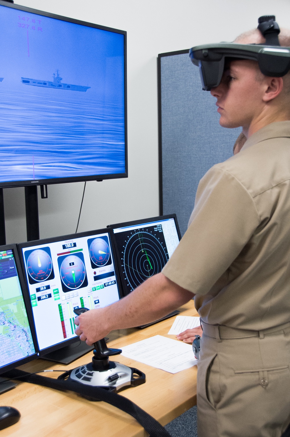Officer Candidate School (OCS) class 16-19 trains using the Conning Officer Virtual Environment (COVE) at Officer Training Command in Newport, Rhode Island (OTCN) on Aug. 8, 2019.