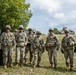 Observer Controller Trainers assigned to the Joint Multinational Readiness Center (JMRC) pose for a picture during a Combined Resolve training exercise in Grafenwoehr Training Area, August, 8, 2019.