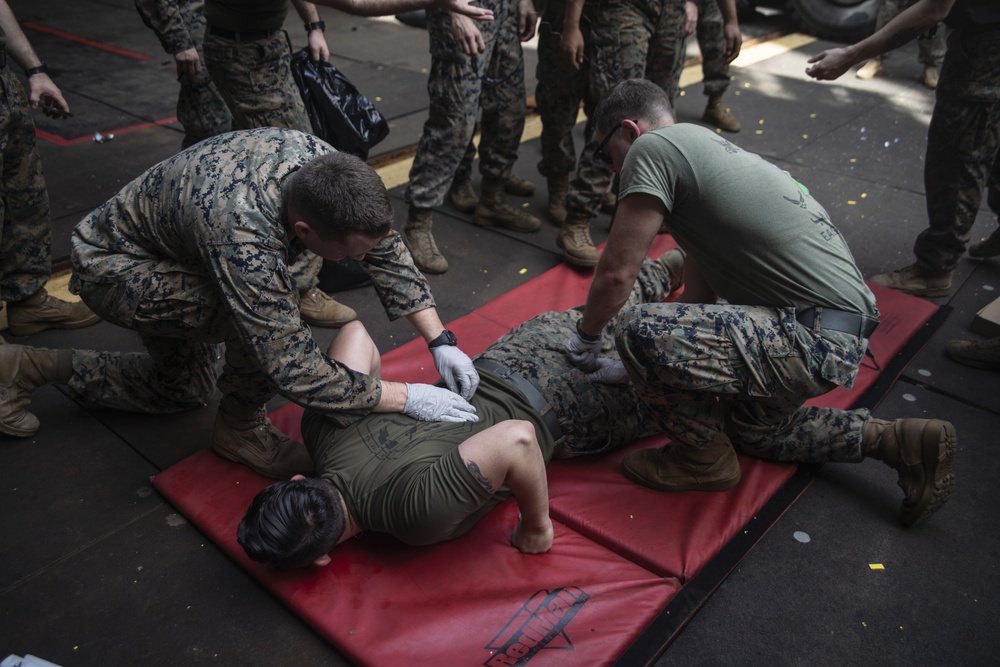 31st MEU Marines hold taser qualification training aboard USS Ashland