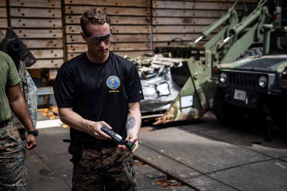 31st MEU Marines hold taser qualification training aboard USS Ashland