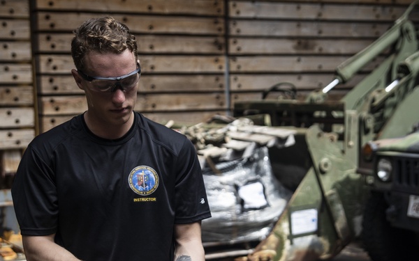 31st MEU Marines hold taser qualification training aboard USS Ashland