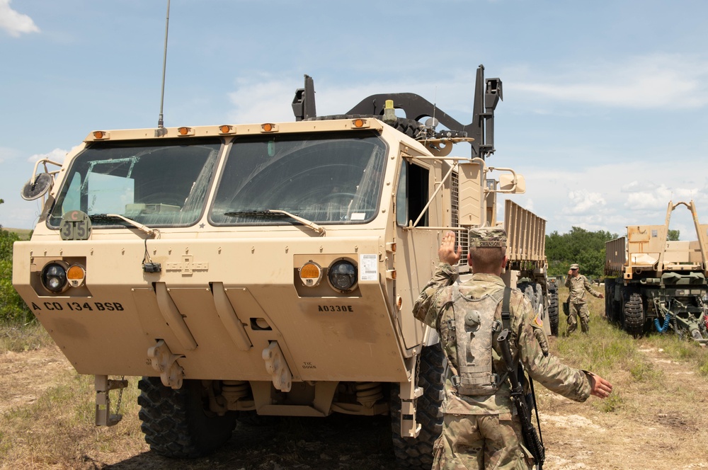 MNNG Soldier Ground Guides PLS Vehicle at XCTC 19-06