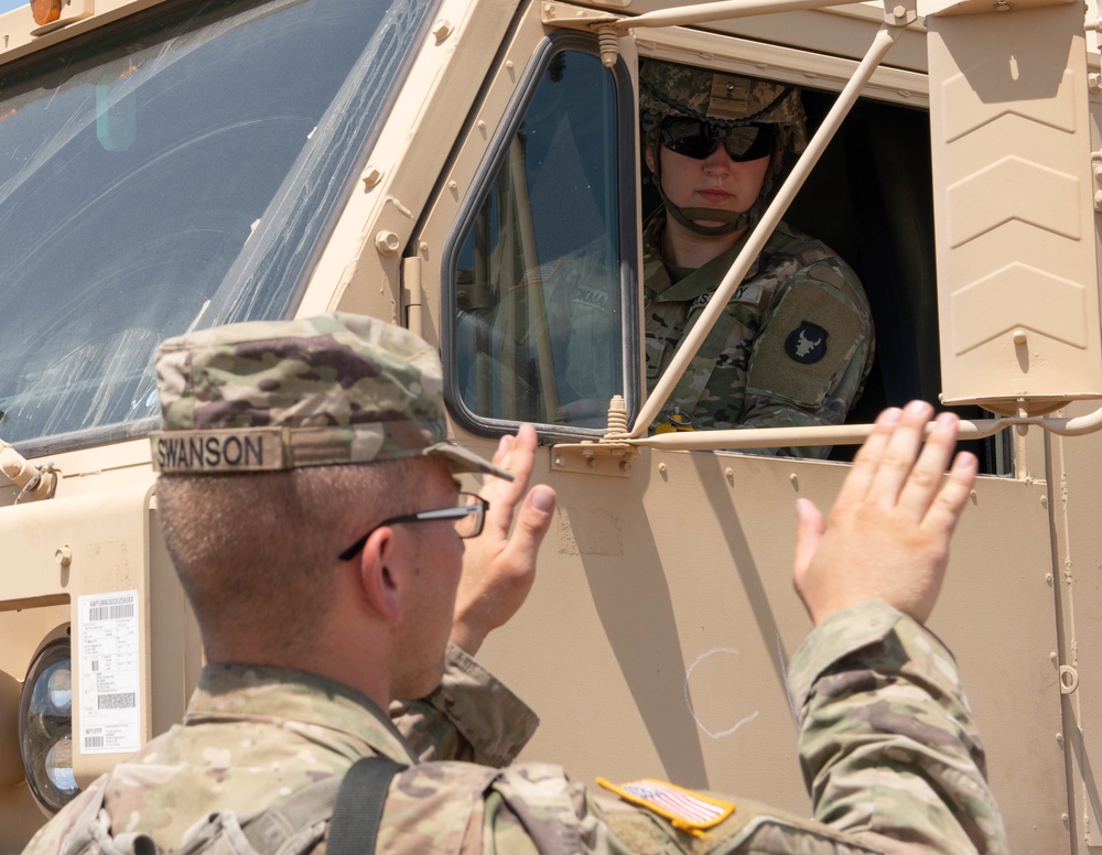 MNNG Soldier Ground Guides PLS Vehicle at XCT