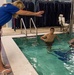 Officer Candidate School (OCS) class 15-19 here at the Lt. Michael P. Murphy Combat Training Pool in Newport, Rhode Island qualifies during the second class swimmer test on Aug. 9, 2019.