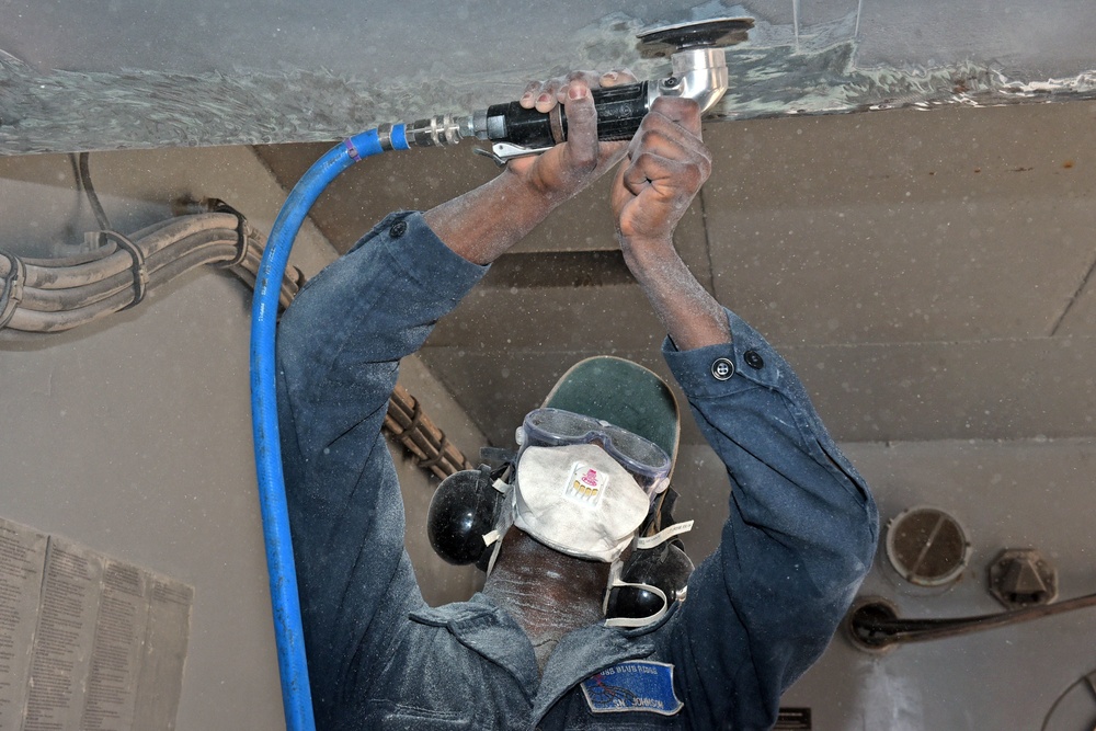USS Blue Ridge Sailors perform corrosion control maintenance